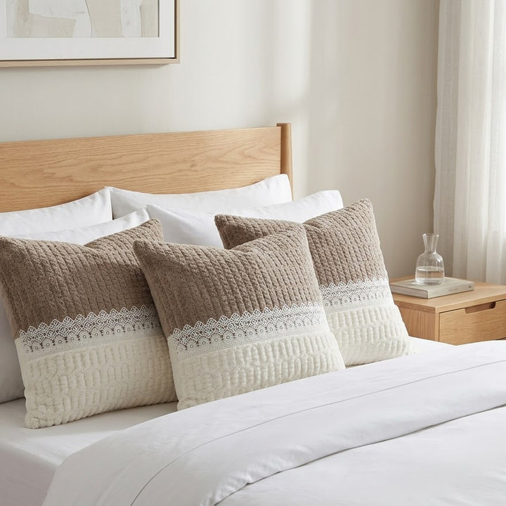 Quilted Brown Ivory cushion covers styled on a bed
