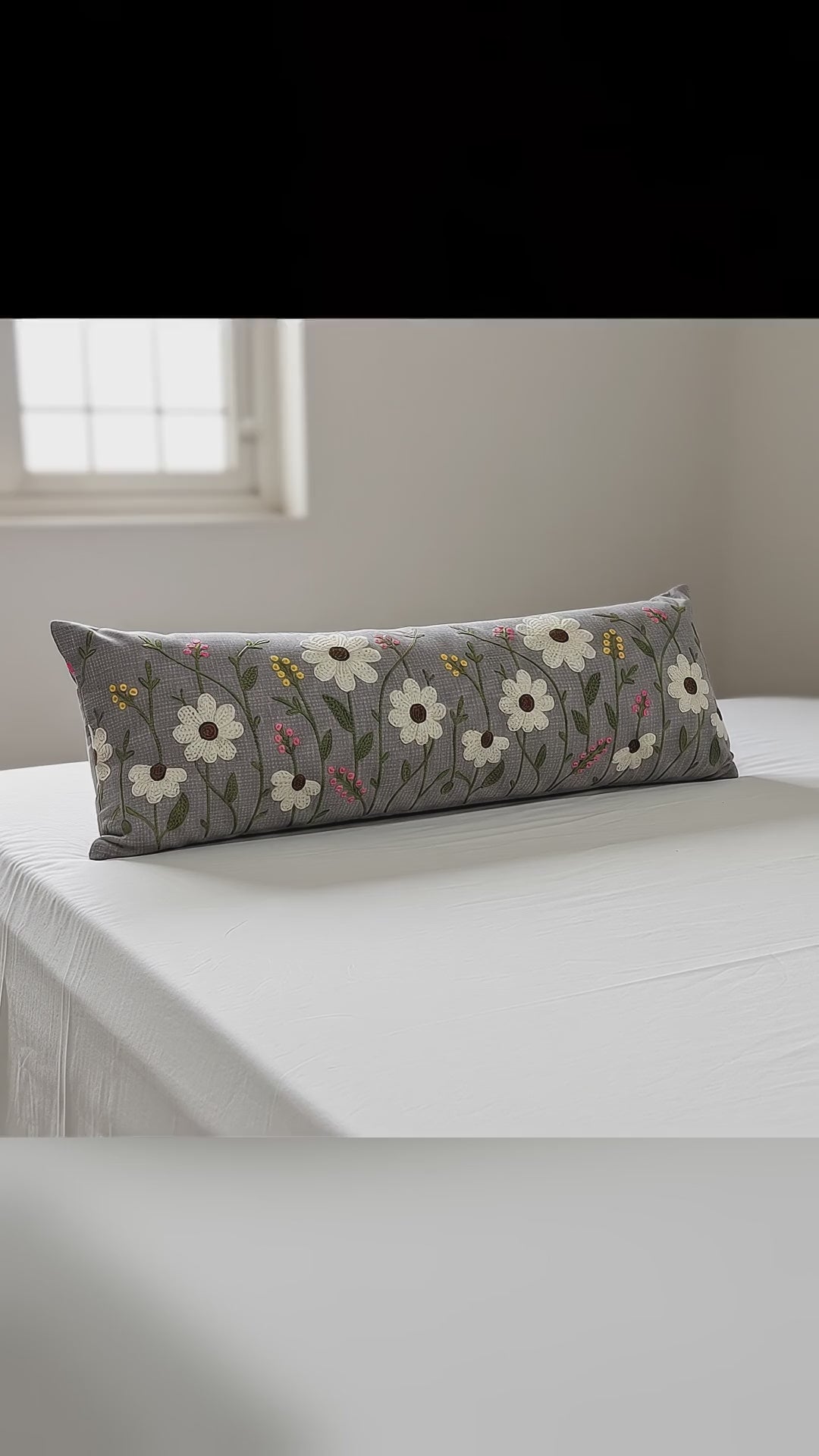 Grey embroidered bolster pillow – video