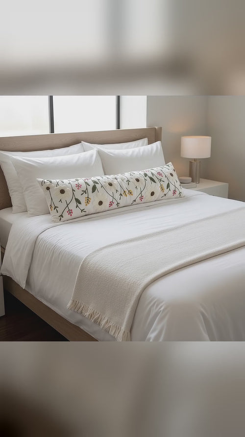 White embroidered bolster pillow – video